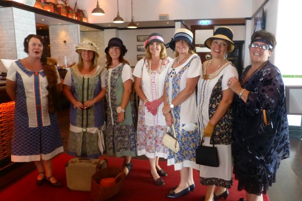 Ladies in 1920s style drop waisted dresses at the Masonic Hotel, Napier