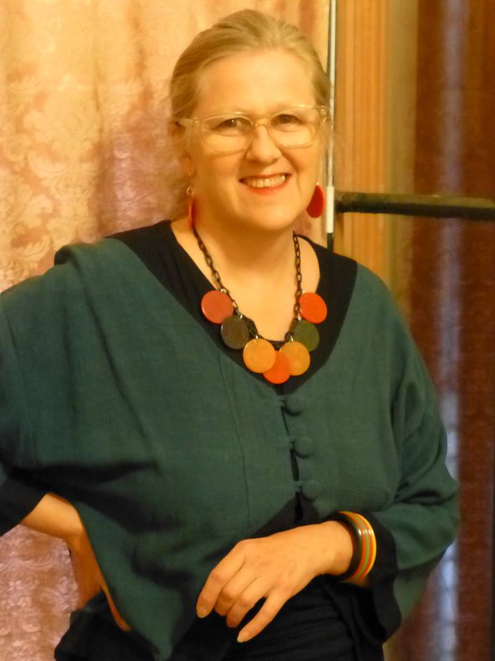 Lesley Postle, author of Decolish.com wearing Bakelite Jewelry