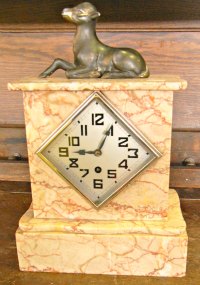 Marble clock with faun or lamb