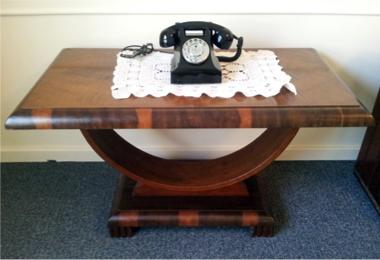 art deco coffee table with Bakelite phone