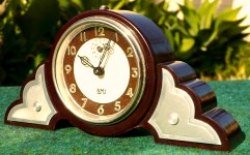 Bakelite Clock with Art Deco Style "Wings"
