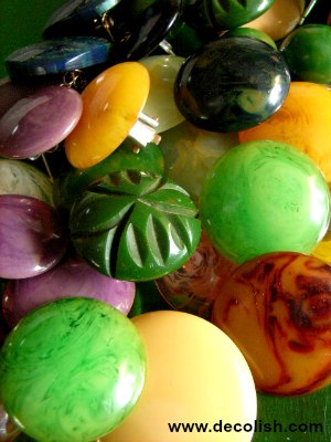 Large colourful pile of Bakelite earrings