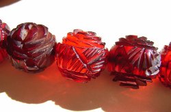 Cherry Amber Bakelite Rose Carved Beads