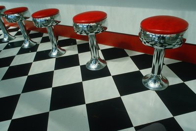 Art Deco Chrome and Red Stools on Black and White Check Floor