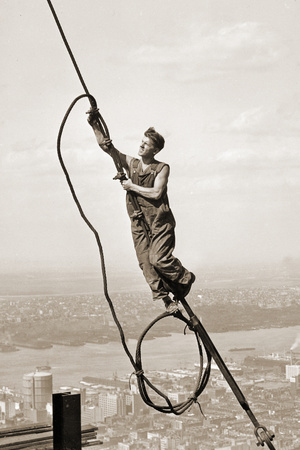 Construction Worker Dangling from a Cable above New York City